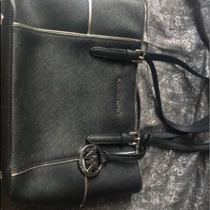 Michael kors black w/ silver lining jet set purse.